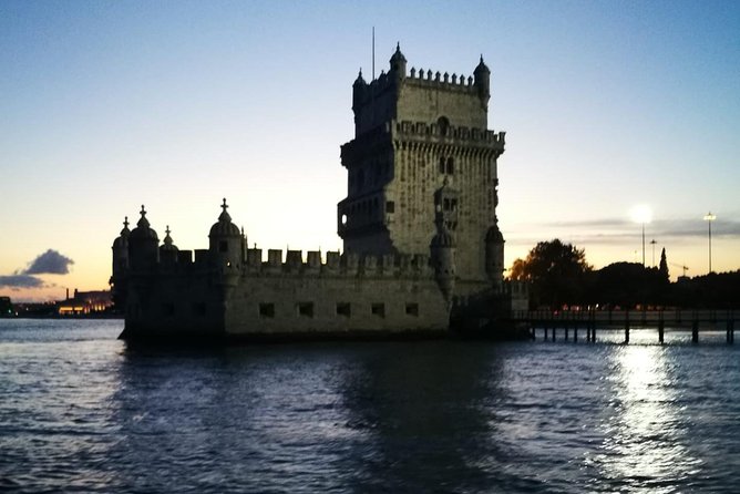 2-Hour Lisbon Traditional Boats Sunset Cruise with White Wine - Lisbon Cathedral and the riverfront skyline you usually miss