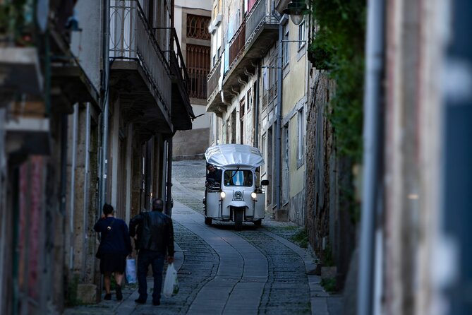 Discover Porto's Highlights on a 2-Hour Private Electric Tuk Tuk - Cordoaria and Clérigos: towers, gardens, and a fast geography lesson