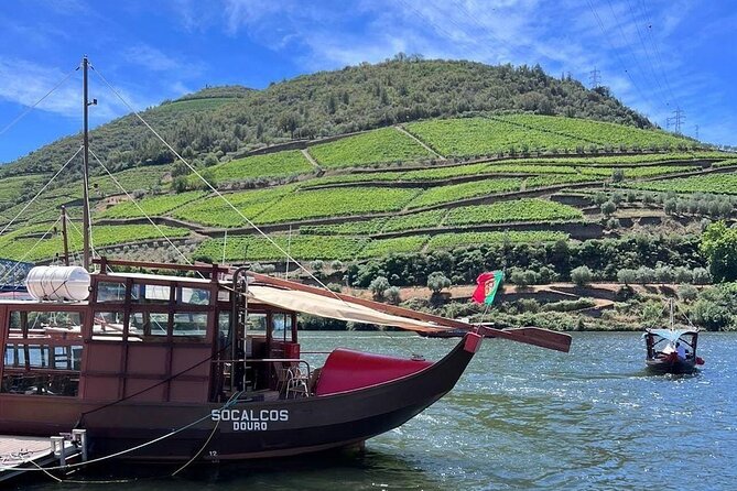 Douro Valley Tour - 3 Wine tastings, Lunch & river Cruise - Peso da Régua: coffee, river views, and a 19th-century bridge walk