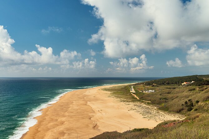 Fatima, Nazare, Obidos 8-People Small Group, Day-Tour from Lisbon - Praia do Norte: waves, surf history, and big-ocean energy