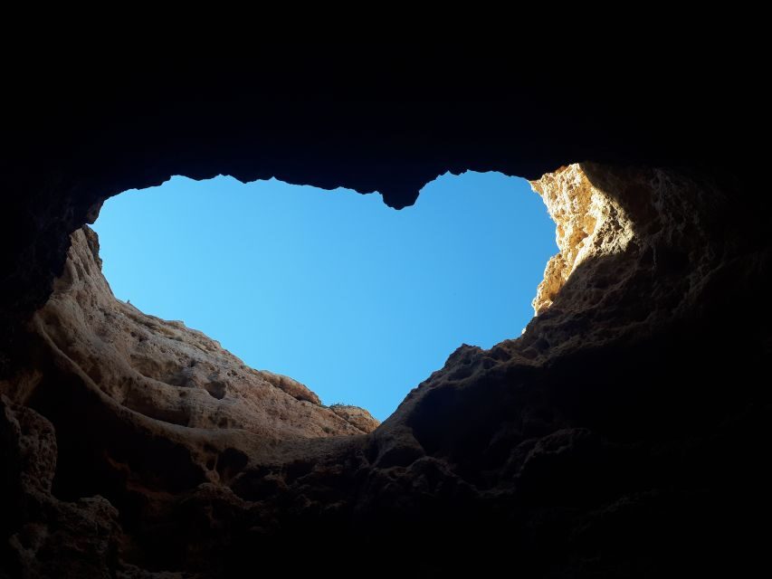 From Benagil: Benagil Caves Kayak Tour - The Tour Rhythm: One Guided Hour by Benagil, One by Praia da Marinha