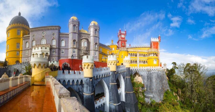 From Lisbon: Sintra Tour - Pena, Regaleira & Monserrate - National Palace of Sintra: Azulejos, High Ceilings, and the Real Town Rhythm