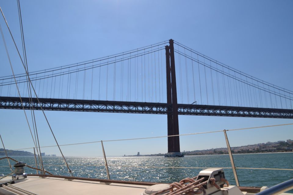 Lisbon: Champagne Sailing Tours - Steering the Yacht Under Sail: The Part That Makes You Feel Like a Character