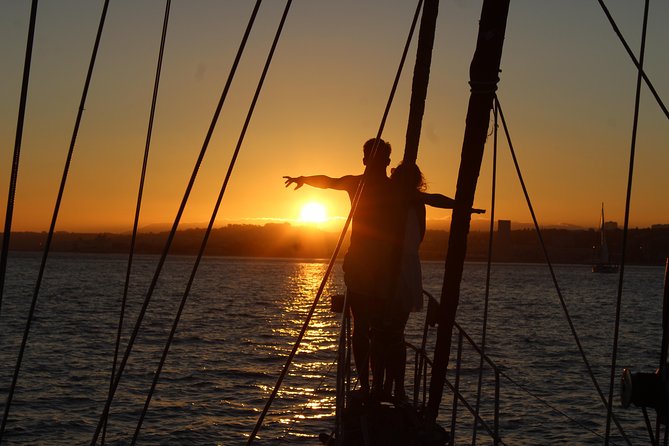 Lisbon: Daylight or Sunset on a Vintage Sailboat - Wine, Petiscos, and the Sunset Route Past the Tagus Waterfront
