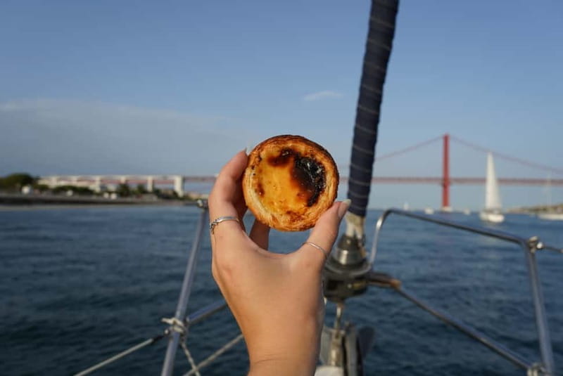 Lisbon: Daytime or Sunset Boat Cruise with History and Wine - 25 de Abril Bridge and Cristo Rei: Two Icons, One River View
