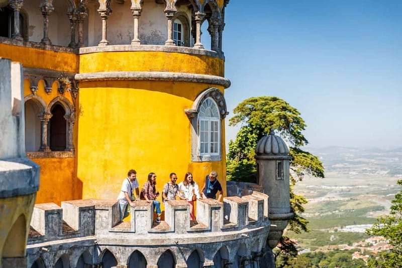 Lisbon: Sintra Cascais & Pena Palace Small Group Tour - Guincho Beach and Estoril: Passing Stops With Context