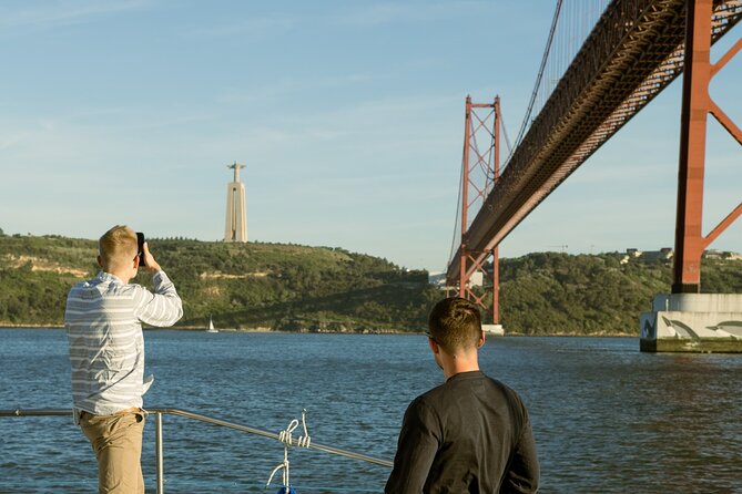 Lisbon: Sunset Catamaran Boat Tour with Music and Drinks - Nets vs covered terrace: where you’ll actually want to sit