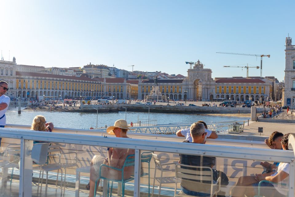 Lisbon: Tagus River Cruise with Welcome Drink - Comfort on a windy river: sundeck rules, indoor seating, and pacing