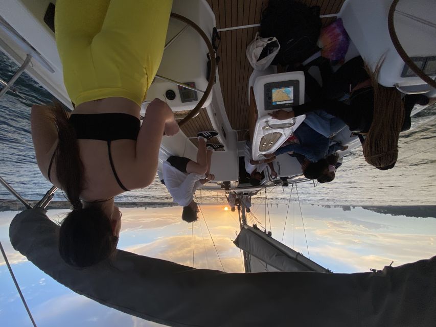 Lisbon: Tagus River Sailboat City Cruise - Sunset on deck: included drink, music, and why timing matters
