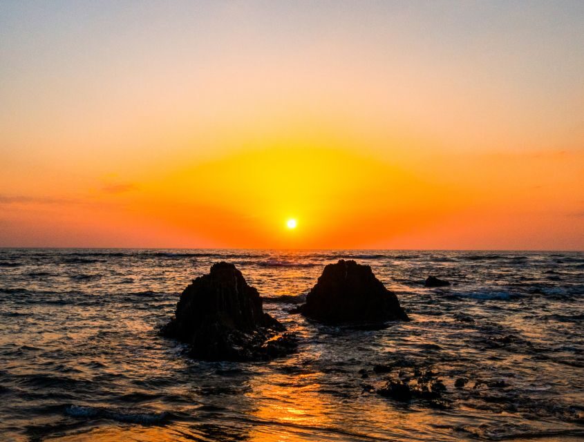 Portimão: Sunset Cruise to Benagil Cave - The sunset moment: Alfanzina Lighthouse and Benagil Beach