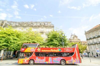 Porto: City Sightseeing Hop-On Hop-Off Bus Tour - Blue Line Stops: Jardim do Morro Views, Shopping, and Wine Stops