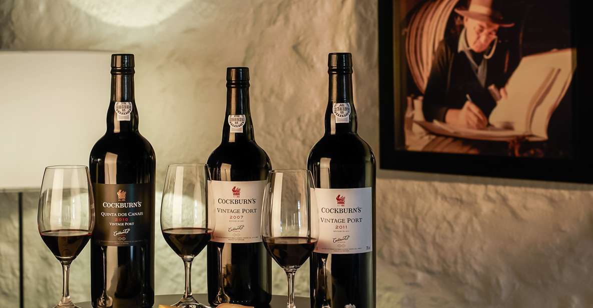 Porto: Cockburn’s Port Lodge Tour and Tasting - Inside the lodge house: granite walls, thousands of barrels, and cooper work