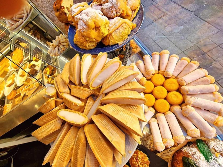 Porto: Douro Valley & Amarante Wine, Food & River Tour - Tasquinha finale: smoked meats and Vinho Verde in old town Amarante