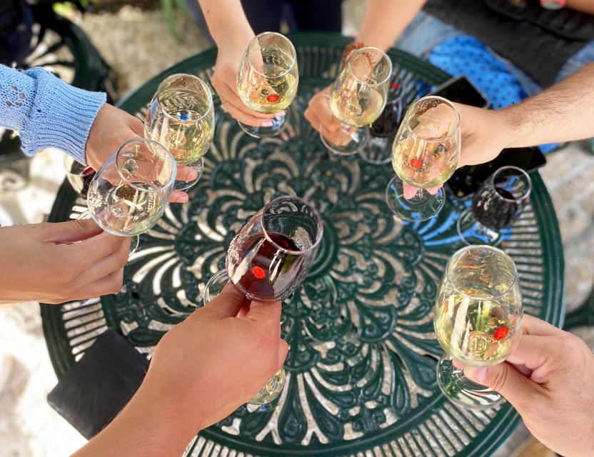Porto: Wine Tasting with Tapas Walking Tour - Porto’s old streets and Ribeira views: the walk is part of the tasting