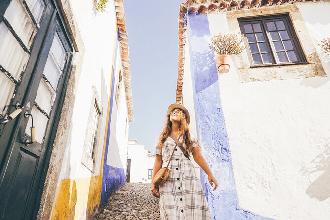 Three Cities in One Day: Porto, Nazare and Obidos from Lisbon - Nazaré: Surf Fame, Cliff Views, and the Forte de São Miguel